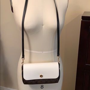 Reversible coach bag